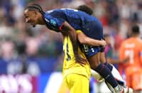DAILON Livramento and Vozinha of Cape Verde celebrate after forcing a 0-0 draw with Saudi Arabia in the FIFA World Cup Group H preliminaries in Houston.