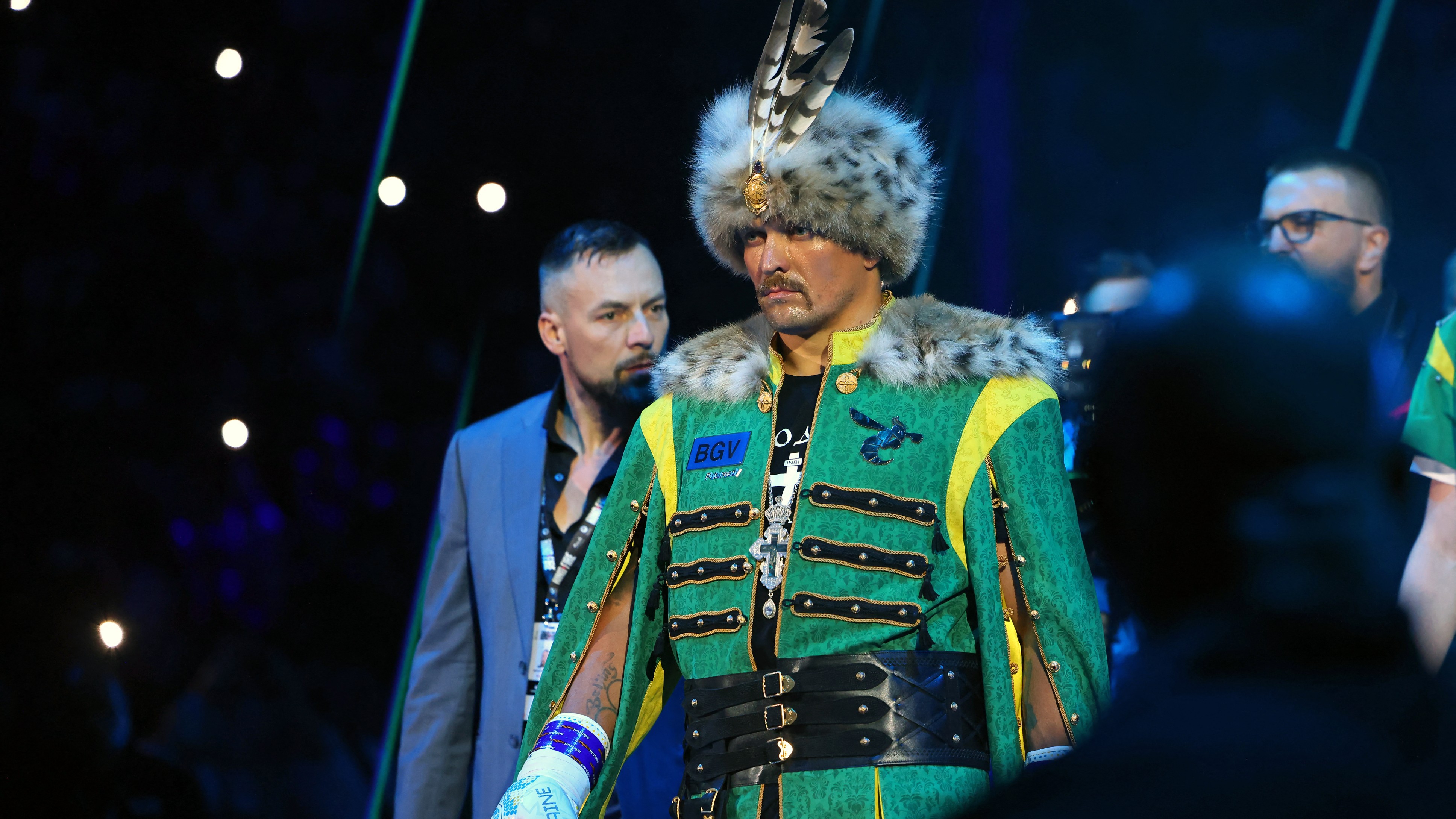 Unbeaten champ Usyk relinquishes world titles