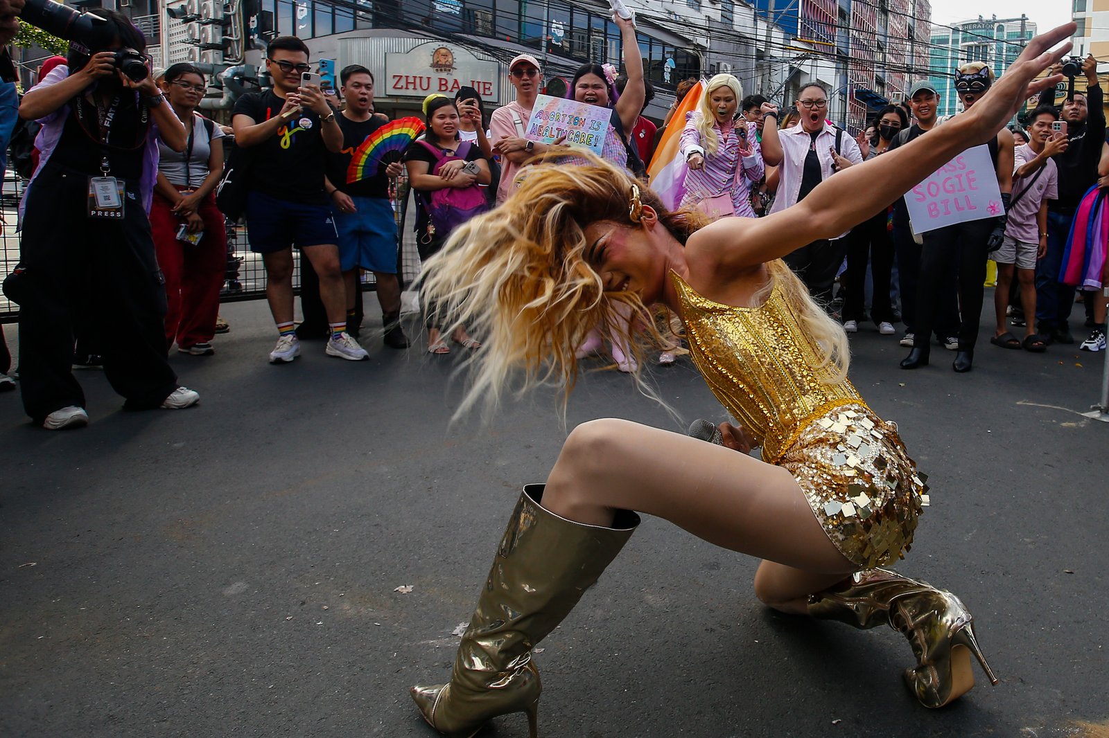 Members of the LGBTQIA+ community and their allies gather at Remedios Circle in Manila on 27 June 2026 during the Metro Pride March and Festival, calling for equality, dignity, justice, and human rights.