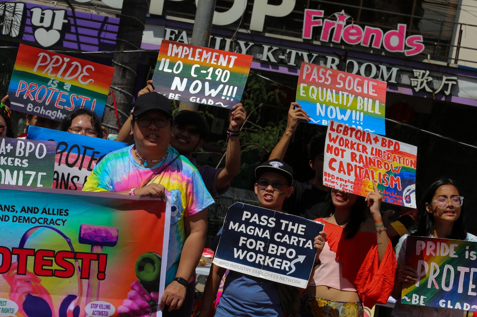 Members of the LGBTQIA+ community and their allies gather at Remedios Circle in Manila on 27 June 2026 during the Metro Pride March and Festival, calling for equality, dignity, justice, and human rights.