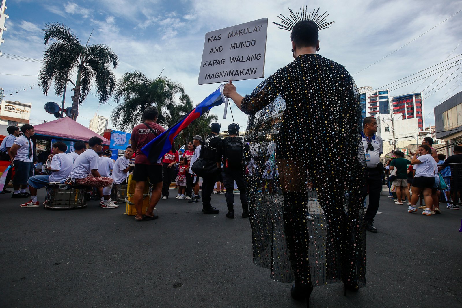Members of the LGBTQIA+ community and their allies gather at Remedios Circle in Manila on 27 June 2026 during the Metro Pride March and Festival, calling for equality, dignity, justice, and human rights.