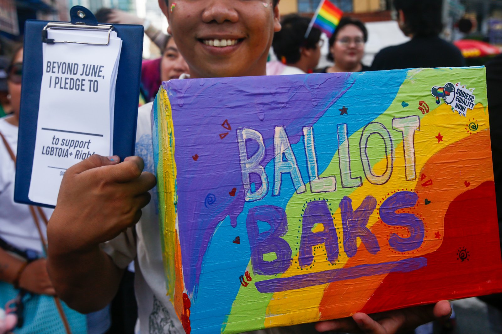Members of the LGBTQIA+ community and their allies gather at Remedios Circle in Manila on 27 June 2026 during the Metro Pride March and Festival, calling for equality, dignity, justice, and human rights.