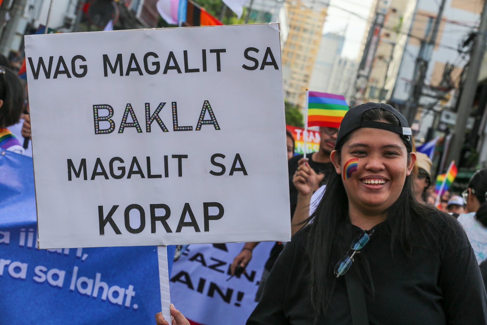 Members of the LGBTQIA+ community and their allies gather at Remedios Circle in Manila on 27 June 2026 during the Metro Pride March and Festival, calling for equality, dignity, justice, and human rights.