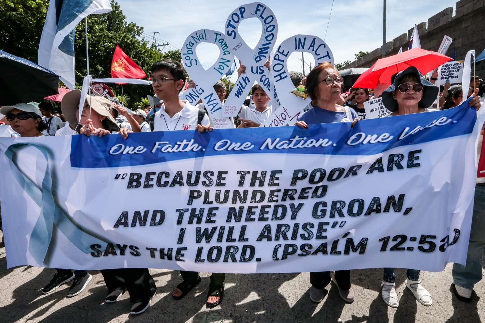 Various progressive groups from different religious, environmental, and political sectors marched down from EDSA shrine to the People Power Monument in a call to end corruption in the country titled ‘White Ribbon March’ on Sunday, 28 June, 2026 in Quezon City. 

The event started with a Catholic mass at National Shrine of Mary, Queen of Peace before marching down with different organizations from different roads nearby People Power Monument where a cultural event was staged.

Authorities are seen visible during the said protest around the area.| Aram Lascano