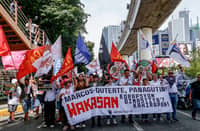 Various progressive groups from different religious, environmental, and political sectors marched down from EDSA shrine to the People Power Monument in a call to end corruption in the country titled ‘White Ribbon March’ on Sunday, 28 June, 2026 in Quezon City.
The event started with a Catholic mass at National Shrine of Mary, Queen of Peace before marching down with different organizations from different roads nearby People Power Monument where a cultural event was staged.
Authorities are seen visible during the said protest around the area.| Aram Lascano