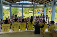 STUDENTS at Lanzones Elementary School in Zamboanga City receive school supplies from Maxim riders ahead of the new school year.