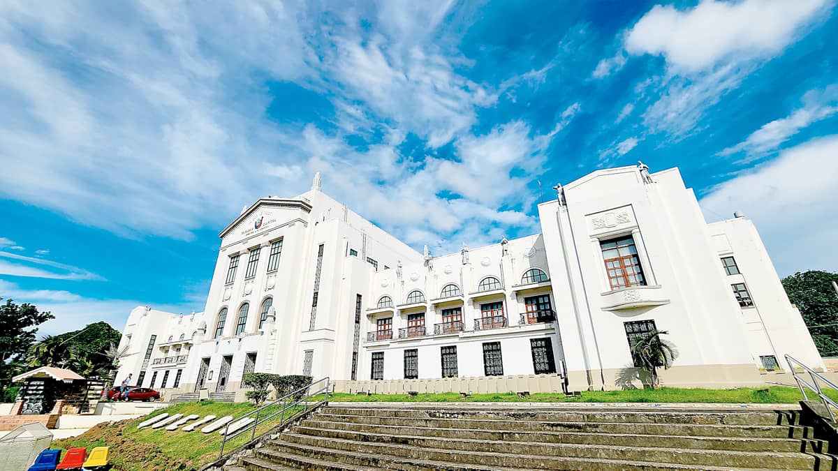 QUEZON PROVINCIAL CAPITOL BUILDING, Lucena City, Quezon. Originally known as the Tayabas Provincial Capitol, when the province was called Tayabas, it remains a defining landmark of Lucena City. Built between 1908 on land donated by then-governor Filemon Perez, it was designed by William Parsons. The building was expanded from 1930 to 1935, designed by Juan Arellano, fusing Neoclassical symmetry with Art Deco elegance—its façade marked by clean lines, grand columns, and balanced proportions. Crowning the rooftop are twenty-four statues sculpted by Italian artist Francesco Riccardo Monti, representing the diverse livelihoods of Quezon’s people. Damaged during World War II, it was rebuilt through the Philippine Rehabilitation (Tydings) Act of 1946. It was declared a National Historical Landmark in 2010.