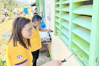 VOLUNTEERS from City Savings Bank in Visayas and Mindanao help prepare learning spaces of their beneficiary schools during the 2026 Brigada Eskwela in Talakag, Bukidnon.