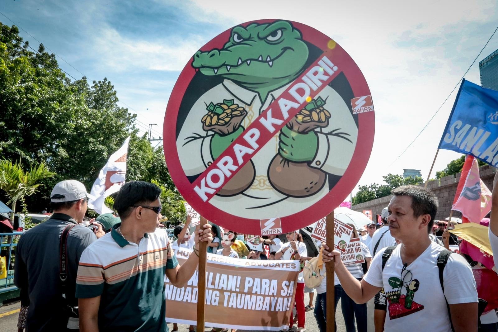Various progressive groups from different religious, environmental, and political sectors marched down from EDSA shrine to the People Power Monument in a call to end corruption in the country titled ‘White Ribbon March’ on Sunday, 28 June, 2026 in Quezon City. 

The event started with a Catholic mass at National Shrine of Mary, Queen of Peace before marching down with different organizations from different roads nearby People Power Monument where a cultural event was staged.

Authorities are seen visible during the said protest around the area.| Aram Lascano