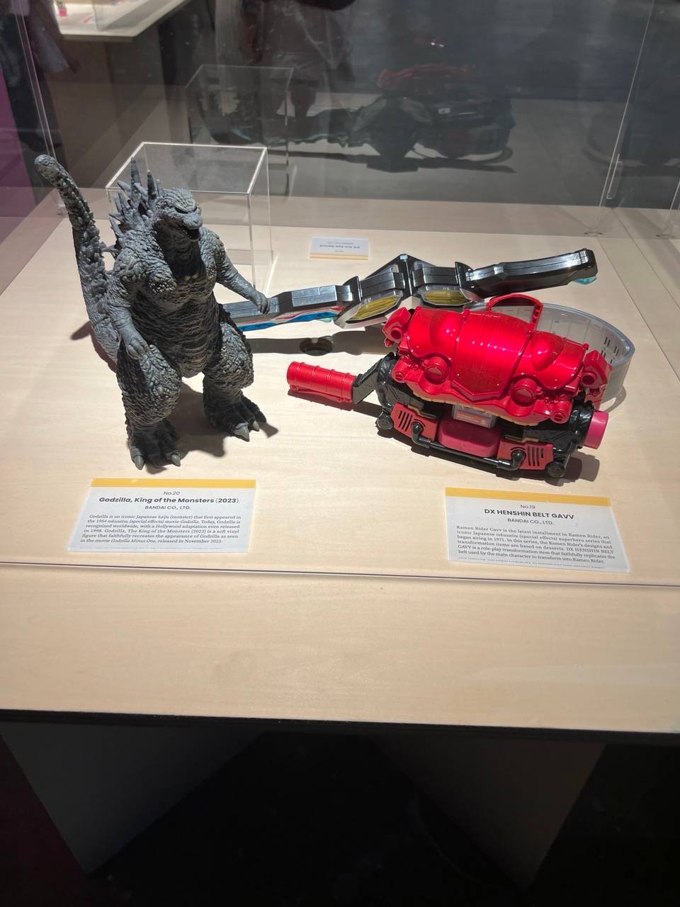 GODZILLA and a Kamen Rider Henshin Belt.