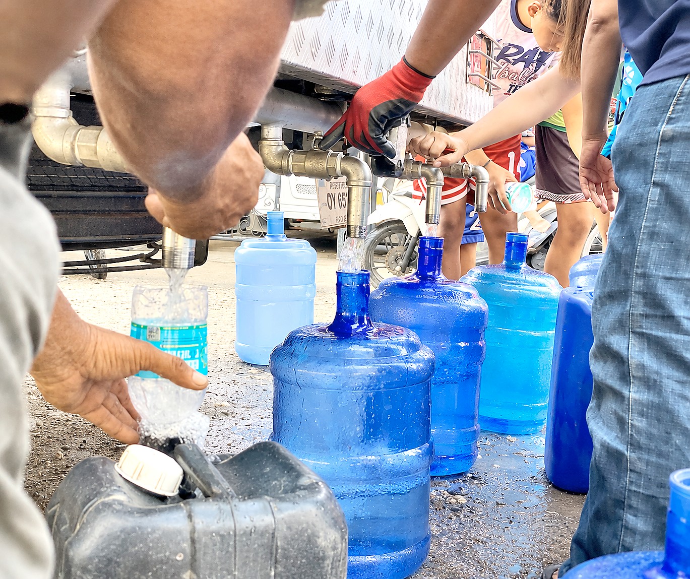 MWF’s AGAPAY: WASH delivers water to quake, eruption victims