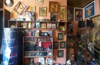 CURATED collection centered around The Phantom of the Opera musical, including books, figures and artwork.
