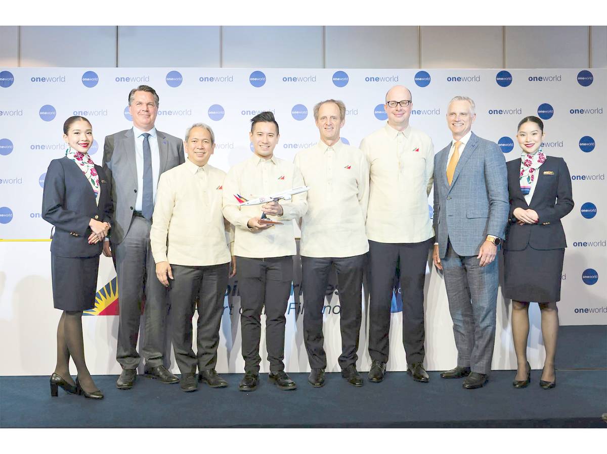 Oneworld Chief Executive Officer Ole Orvér (2nd from left), Philippine Airlines Executive Vice President / Chief Operating Officer Atty. Carlos Luis Fernandez (3rd from left), PAL Holdings, Inc. President Lucio C. Tan III (4th from left), Philippine Airlines President Richard Nuttall (4th from right), Philippine Airlines Vice President – Revenue Management, Commercial Planning & Alliances Christoph Gaertner (3rd from right) and American Airlines Chief Executive Officer and Chairman of the oneworld Governing Board Robert Isom (2nd from right).