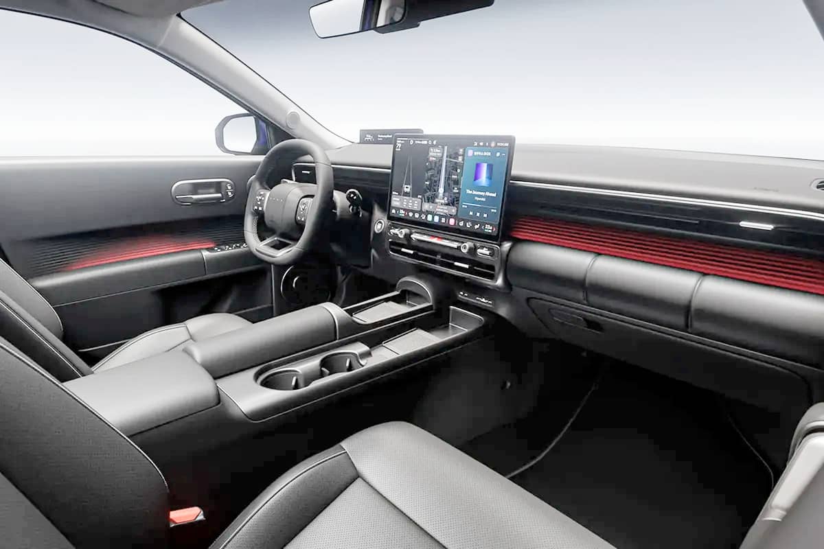 CABIN layout places a large center screen, physical controls and two wireless charging pads inside the new Hyundai Elantra.