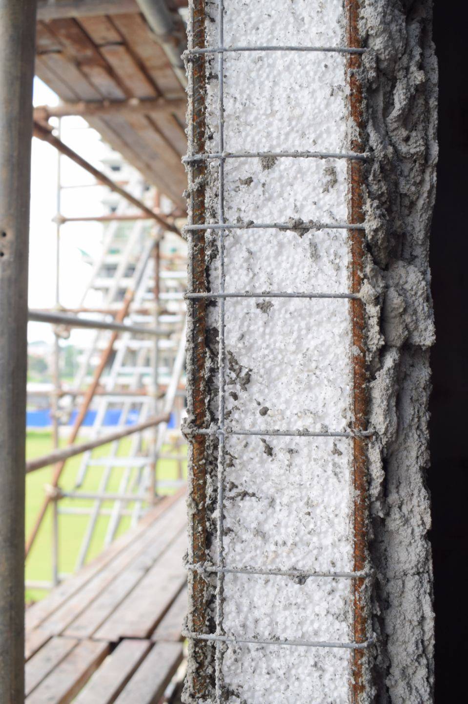 NXT Panel’s EPS core and steel wire mesh system, mid-construction.
