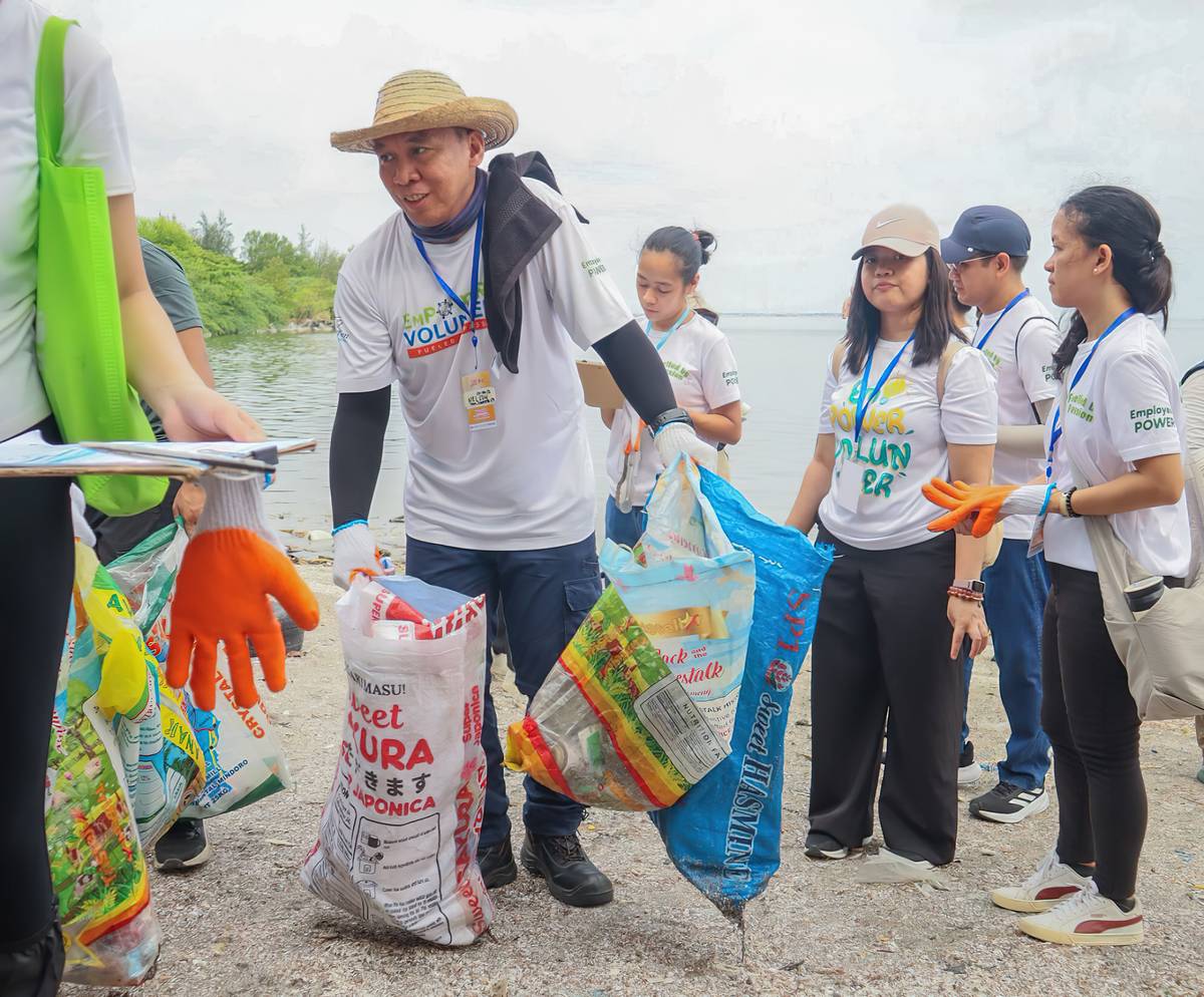FIRST gen and Lopez Group volunteers join a coastal cleanup drive at the Freedom Island inside the Las Piñas-Parañaque Wetland Park as part of the Month of the Ocean celebration in the Philippines.