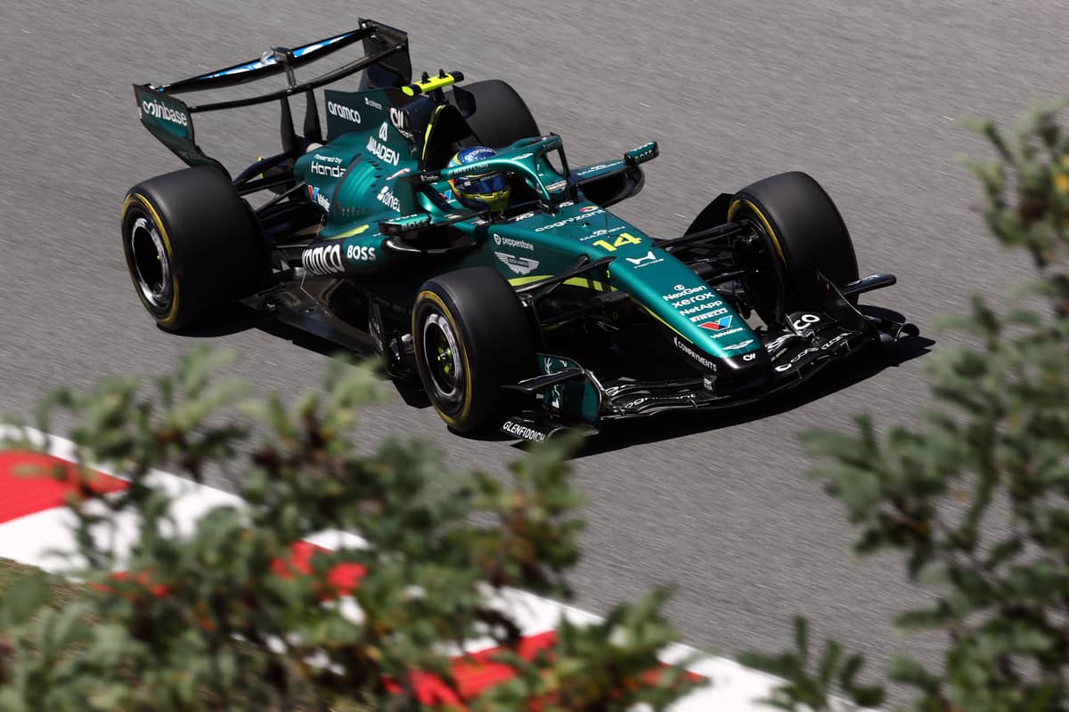 PUSHING through practice, Fernando Alonso takes the Aston Martin around the Circuit de Catalunya ahead of the Catalonia Formula One Grand Prix in Montmelo, Spain.