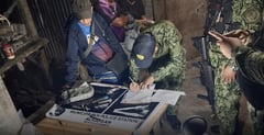 Police dismantle alleged arms and drug syndicate