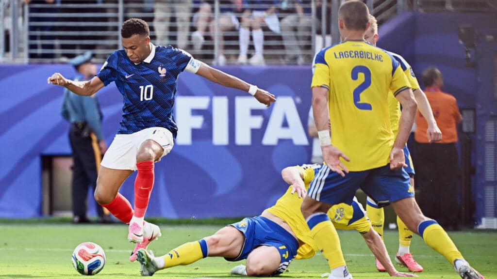 Kylian Mbappe scores France's opener in their win over Sweden on Tuesday which took them into the World Cup last 16