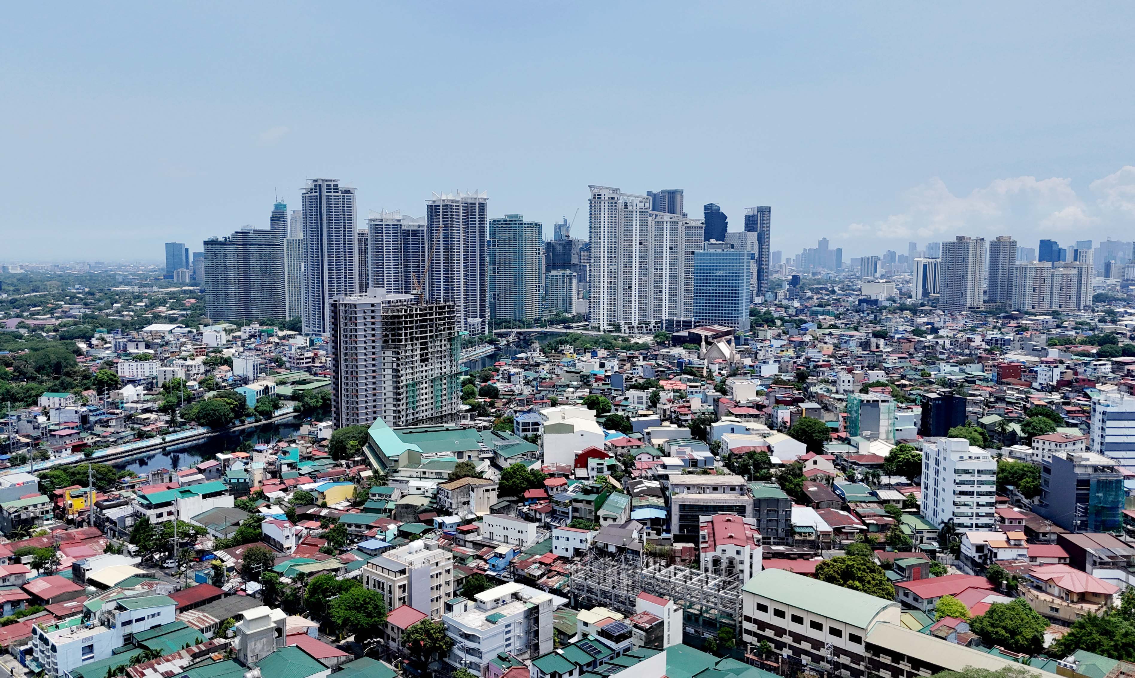 (July 02 2026) A view of the buildings of Taguig and Makati were seen from Mndaluyong City. The World Bank Group's latest country income classifications, released July 1, moved the Philippines from lower-middle-income to upper-middle-income status based on 2025 gross national income per capita estimates. The nation achieved this status after its Gross National Income (GNI) per capita reached $4,850, exceeding the $4,636 threshold for this income bracket.  Under the updated thresholds, upper-middle-income economies are those with GNI per capita of $4,636 to $14,375. Lower-middle-income economies are those with GNI per capita of $1,176 to $4,635, while high-income economies are those above $14,375. Photo/Analy Labor