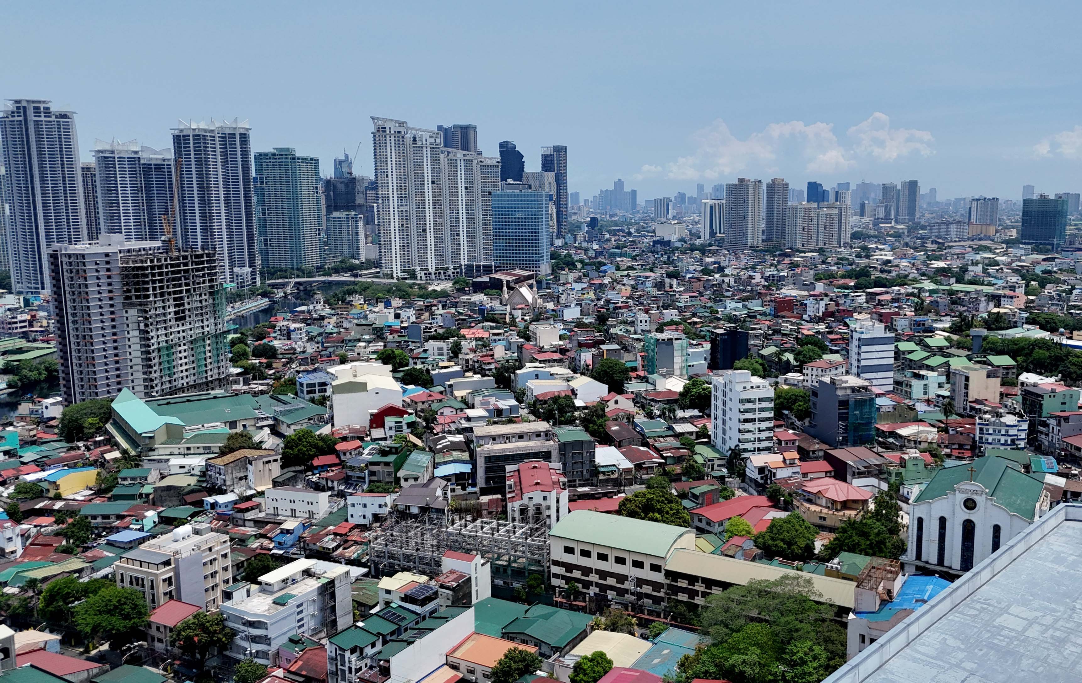 (July 02 2026) A view of the buildings of Taguig and Makati were seen from Mndaluyong City. The World Bank Group's latest country income classifications, released July 1, moved the Philippines from lower-middle-income to upper-middle-income status based on 2025 gross national income per capita estimates. The nation achieved this status after its Gross National Income (GNI) per capita reached $4,850, exceeding the $4,636 threshold for this income bracket.  Under the updated thresholds, upper-middle-income economies are those with GNI per capita of $4,636 to $14,375. Lower-middle-income economies are those with GNI per capita of $1,176 to $4,635, while high-income economies are those above $14,375. Photo/Analy Labor