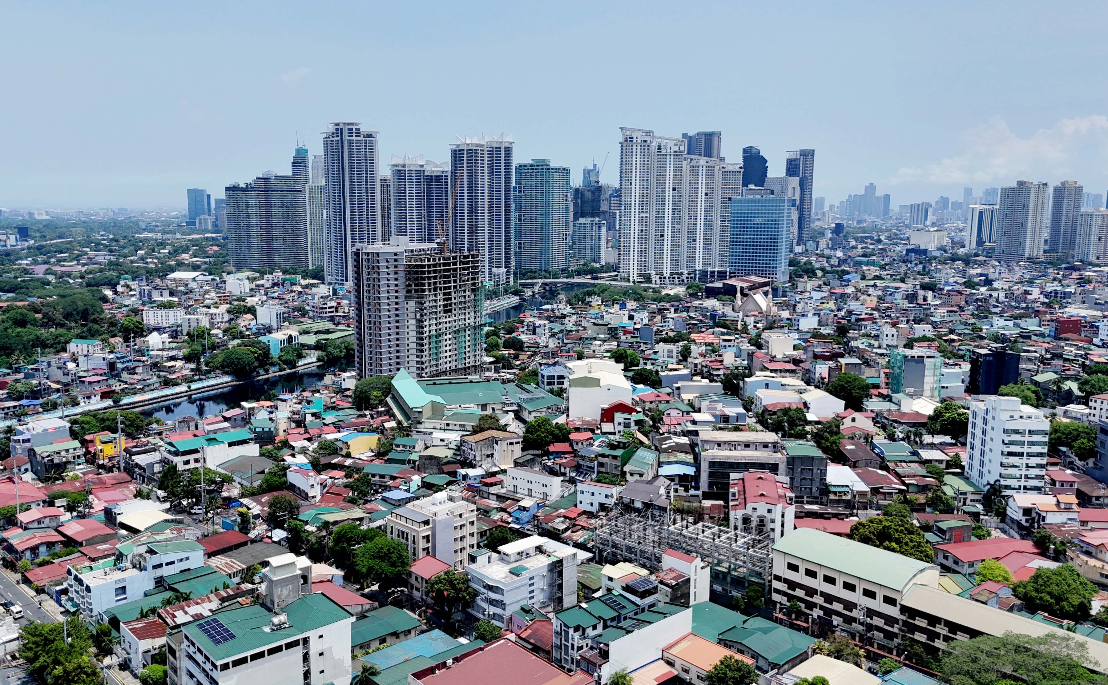 (July 02 2026) A view of the buildings of Taguig and Makati were seen from Mndaluyong City. The World Bank Group's latest country income classifications, released July 1, moved the Philippines from lower-middle-income to upper-middle-income status based on 2025 gross national income per capita estimates. The nation achieved this status after its Gross National Income (GNI) per capita reached $4,850, exceeding the $4,636 threshold for this income bracket.  Under the updated thresholds, upper-middle-income economies are those with GNI per capita of $4,636 to $14,375. Lower-middle-income economies are those with GNI per capita of $1,176 to $4,635, while high-income economies are those above $14,375. Photo/Analy Labor