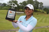 CHANELLE Avaricio lifts the trophy after closing with a 70 to win the ICTSI Pinewoods Challenge on Thursday in Baguio City.