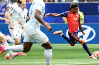 Lamine Yamal (right) strikes ball in victory for Spain against Austria in the World Cup.
