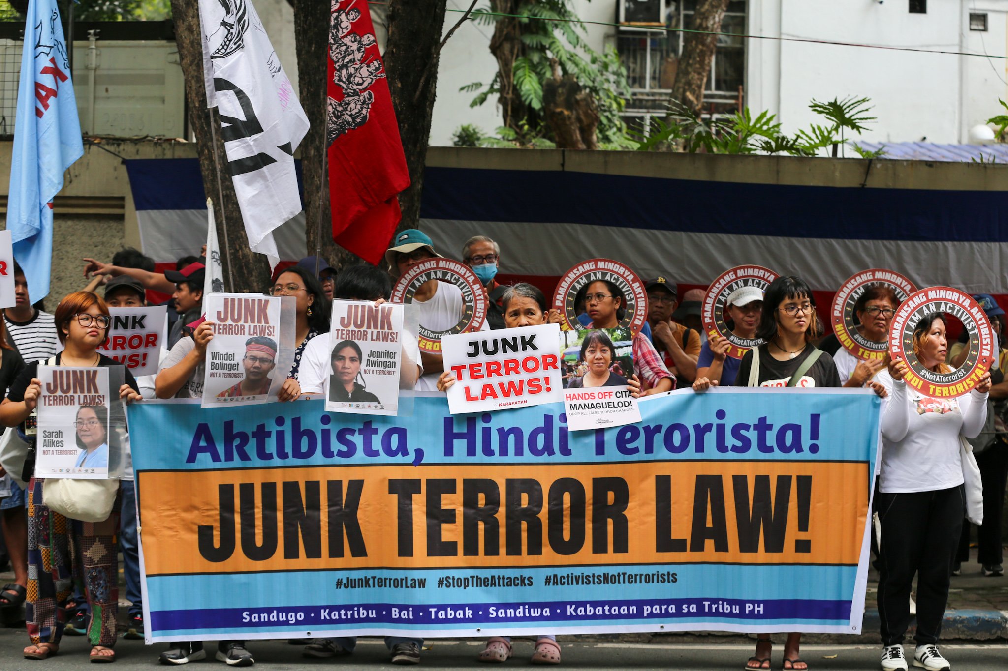 Human rights groups gather outside the Department of Justice on 03 July 2026 to protest alleged human rights violations linked to the implementation of the Anti-Terrorism Act of 2020 and the Terrorism Financing Prevention and Suppression Act of 2012. The demonstration also marks the sixth anniversary of the Anti-Terrorism Act's entry into force.