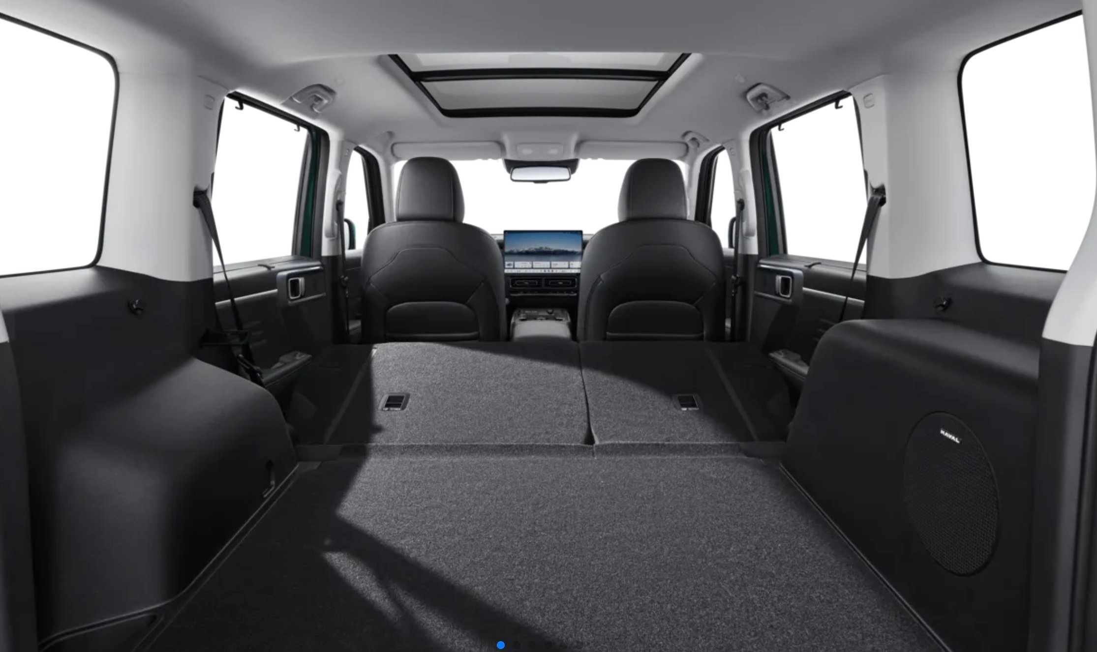 CABIN space in the 2026 GWM Haval H7 shows the fold-flat rear seats, panoramic sunroof and large center display.