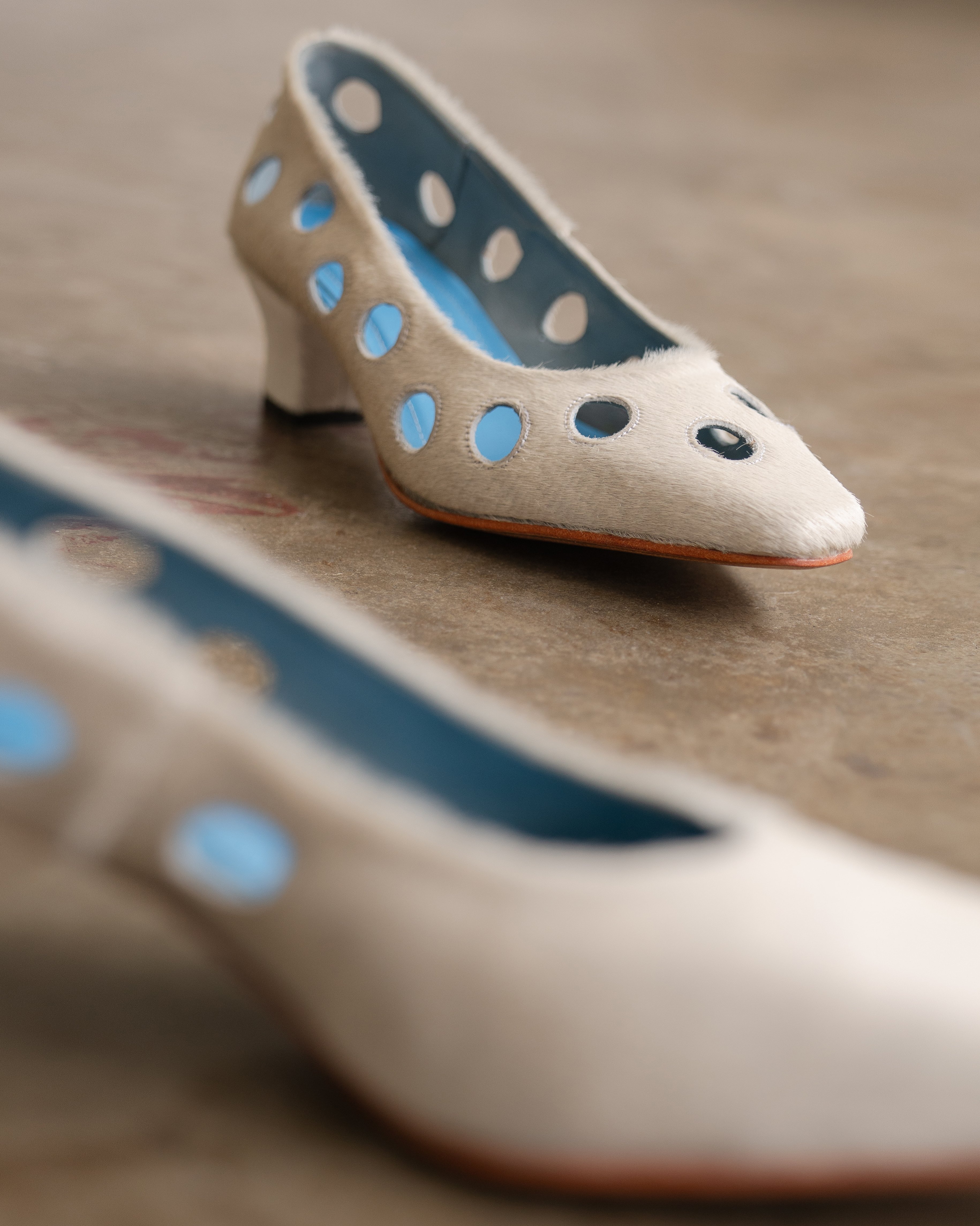 ALEXIE by Alexie Nethercott continues the story of ‘Pieces,’ where leather scraps are thoughtfully transformed into new forms and textures by hand.