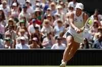 IGA Swiatek displays her deadly form in a ruthless 6-1, 6-3 win over Karolina Pliskova in the Round of 64 of the Wimbledon Championships women’s singles event.
