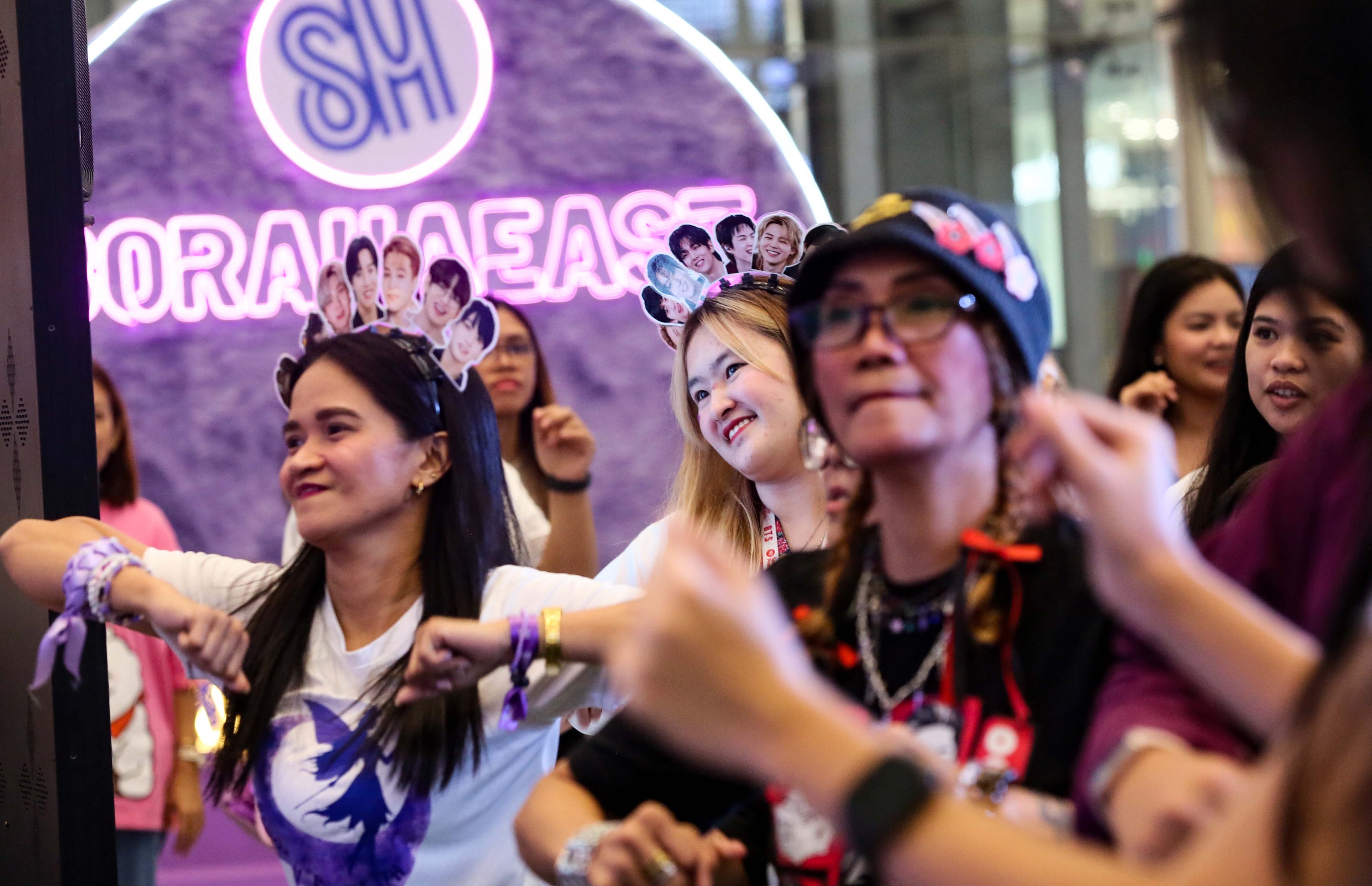 (July 04 2026) Fans of super Kpop group BTS dance and play during the BorahaEast 2.0 ARMY fan gathering at the SM City Masinag in Antipolo, Rizal on Saturday, July 4, 2026.. Photo/Analy Labor