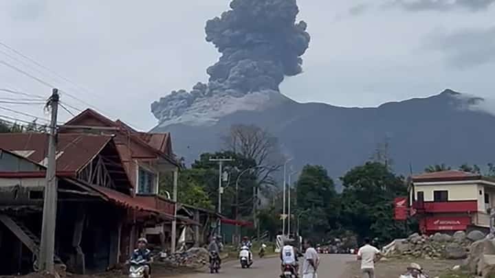 FIERY awakening Mount Kanlaon erupts over Negros Island, sending a towering plume of ash into the sky during its latest bout of volcanic unrest.
