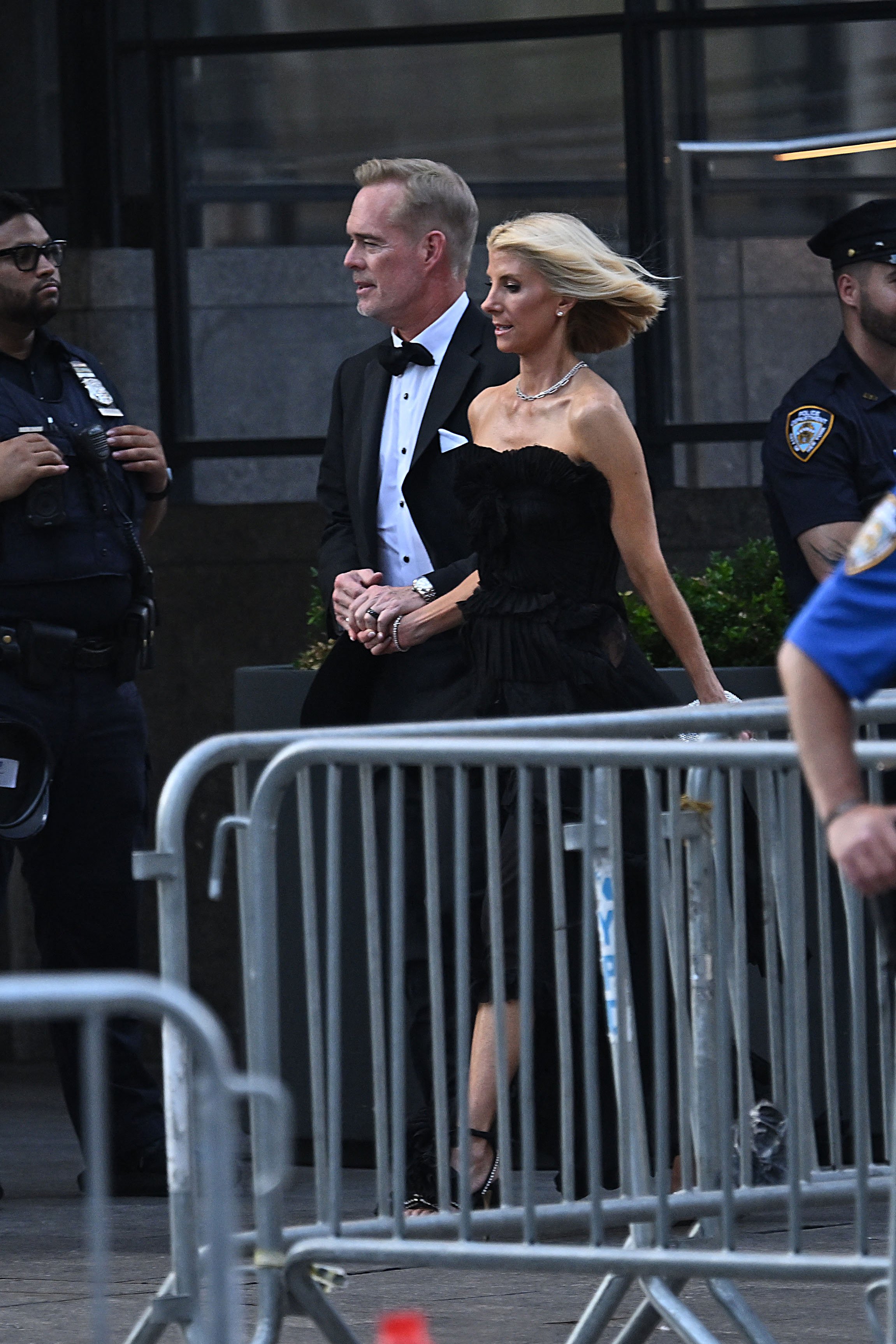 Sportscasters Joe Buck and wife Michelle Beisner-Buck.