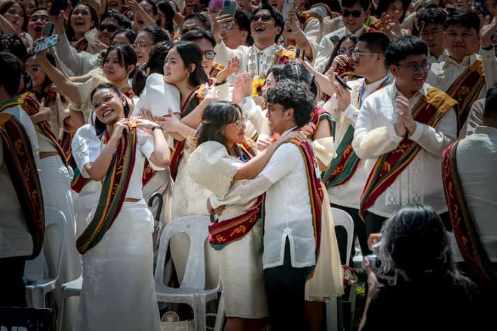 Various progressive graduates staged a protest after the graduation rites ceremony at University of the Philippines Diliman, Quezon City on Sunday, 5 July, 2026.
Over 5022 students from various degrees celebrated their graduation rites.
Graduates were also seen to strike a pose at the University Avenue of UP Diliman on Sunday, 5 July, 2026 in Quezon City. | Aram Lascano
