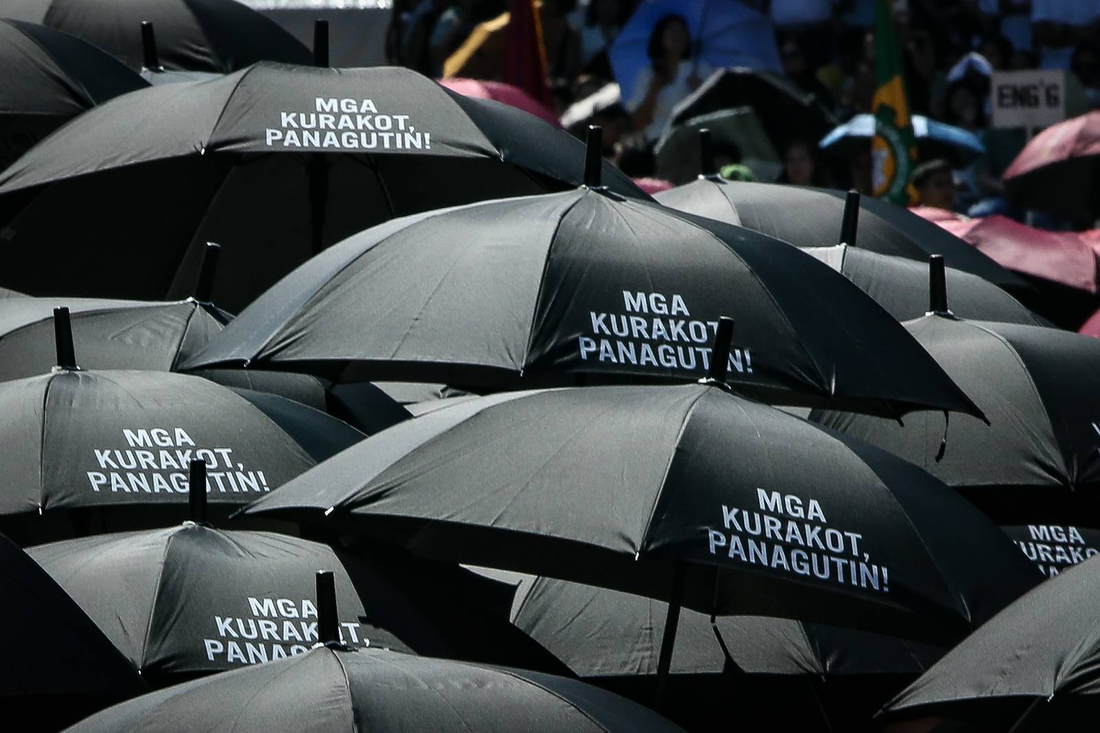 Various progressive graduates staged a protest after the graduation rites ceremony at University of the Philippines Diliman, Quezon City on Sunday, 5 July, 2026. 

Over 5022 students from various degrees celebrated their graduation rites.

Graduates were also seen to strike a pose at the University Avenue of UP Diliman on Sunday, 5 July, 2026 in Quezon City. | Aram Lascano