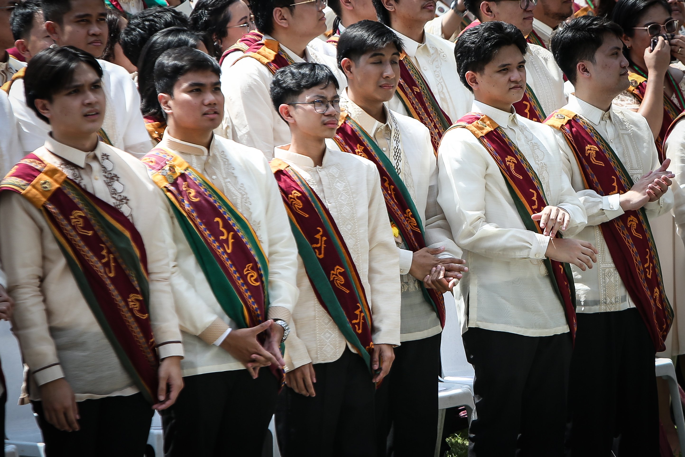 Various progressive graduates staged a protest after the graduation rites ceremony at University of the Philippines Diliman, Quezon City on Sunday, 5 July, 2026. 

Over 5022 students from various degrees celebrated their graduation rites.

Graduates were also seen to strike a pose at the University Avenue of UP Diliman on Sunday, 5 July, 2026 in Quezon City. | Aram Lascano