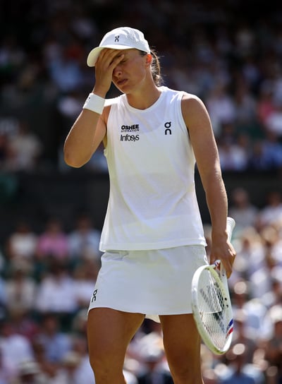 Swiatek shrugs off shock loss