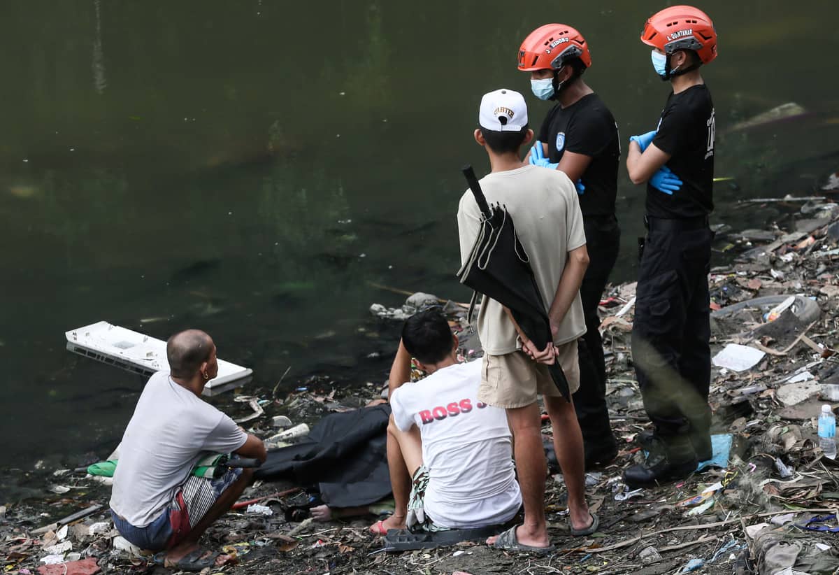 (July 07 2026) Scene of the Crime Operative SOCO investigate the lifeless body of the seven year old boy allegedly fell off at Dario river while flying a kite at Brgy. Bahay Toro in Quezon City on Monday afternoon, due to heavy rain and the water flow going strong the body was found at San Juan river in Brgy Apolonio Samson, Quezon City. Photo/Analy Labor