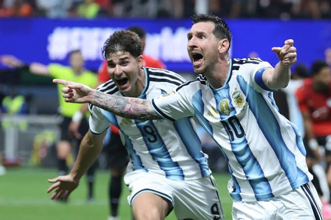 Messi makes history as Argentina reaches quarterfinals