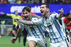 Messi makes history as Argentina reaches quarterfinals