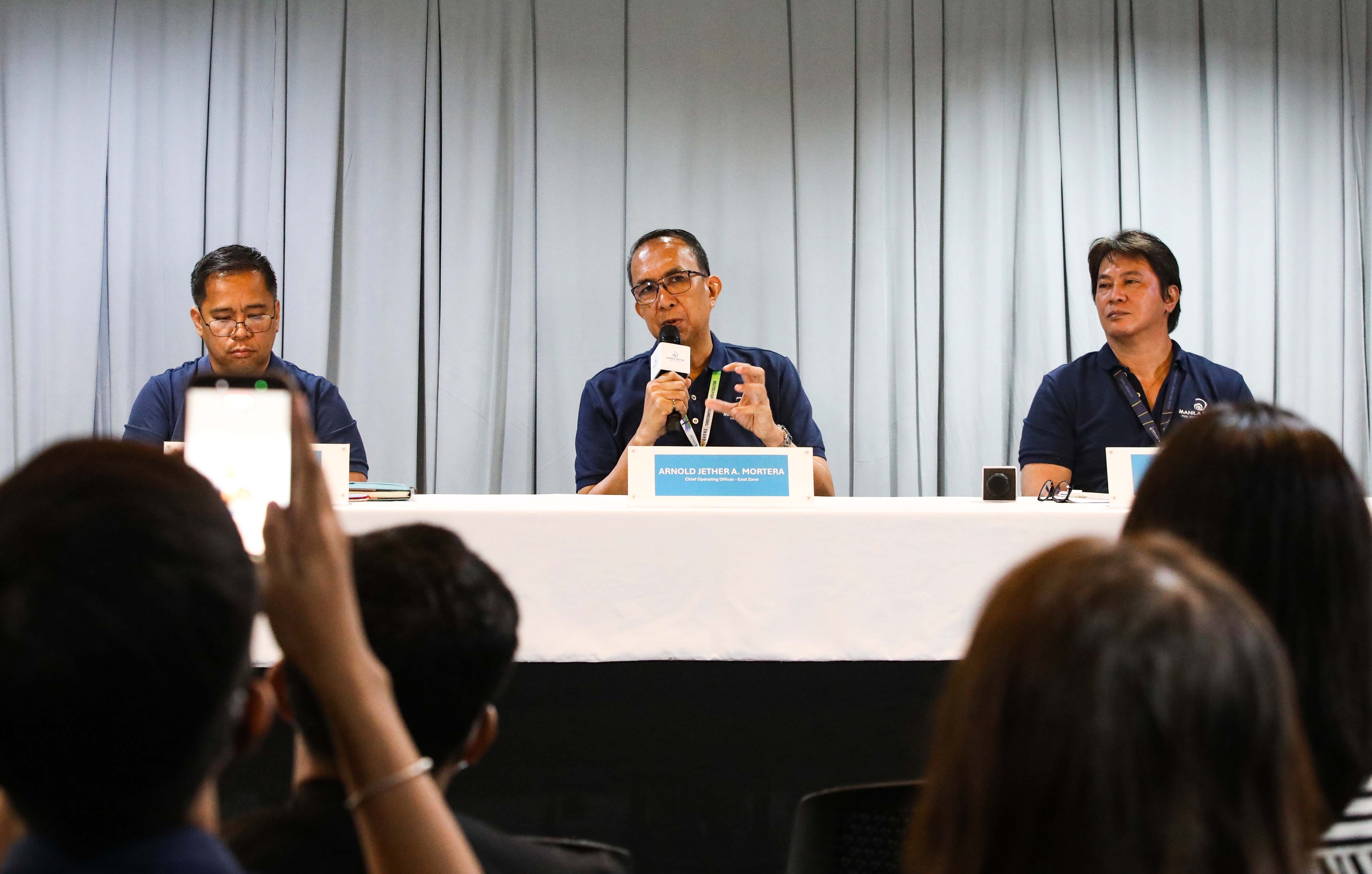 (July 07 2026) Manila Water officials, Joemar B. Emboltorio, Operations Group Director-East Zone; Arnold Jether A. Mortera, Chief Operating Officer (East Zone); and Jeric T. Sevilla, Communication Affairs Group Director- Enterprise, hold a press briefing to discuss the company's water supply situation, how new water sources—including the Upper Wawa Dam and Laguna Lake—along with upcoming treatment facilities, have significantly strengthened Manila Water’s capability to provide reliable 24/7 water service even during prolonged dry spells. The company emphasized that these infrastructure investments and operational enhancements have positioned it to better withstand the impacts of a super El Niño while ensuring water security for customers across the East Zone, held at MWSS office in Quezon City, on Tuesday July 7 2026. Photo/Analy Labor