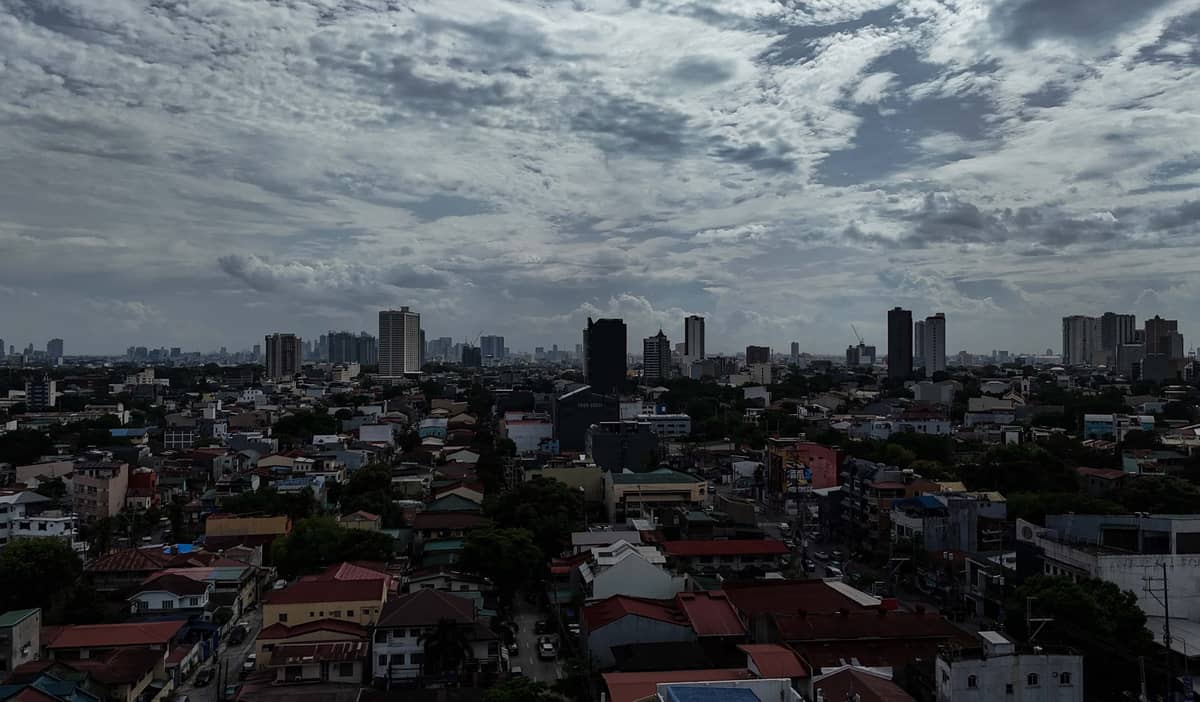 (July 09 2026) Cloudy skies hovered Metro Manila seen from Quezon City on Thursday July 9 2026, according to PAGASA Super typhoon Inday weakened into a typhoon early Thursday. However, moderate to heavy rainfall is likelier on Friday and Saturday over Zamboanga, Lanao, Negros, Panay, MIMAROPA, CALABARZON, Central Luzon, Ilocos, and Metro Manila. Widespread and serious flooding and landslides remain possible in these areas. The public is advised to continue monitoring updates on the typhoon and Habagat. Photo/Analy Labor