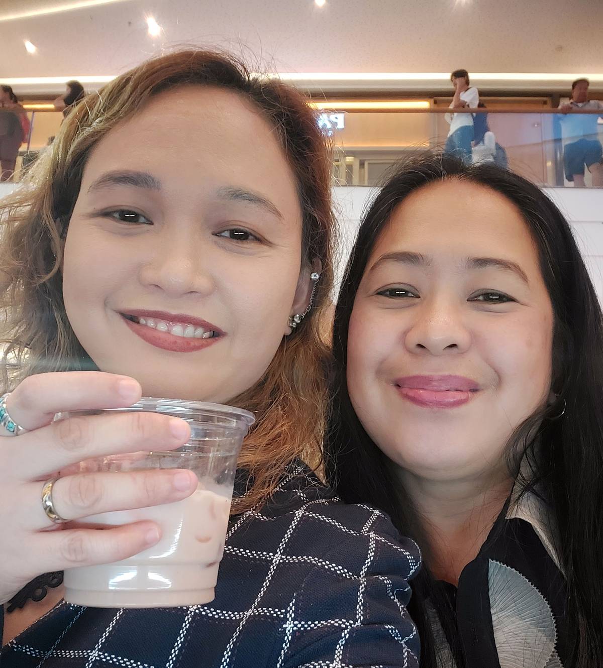 Destileria Limtuaco’s Alma San Buenaventura with the author sampling the brewery’s Intramuros Oat Milk, a popular cocktail in weddings.