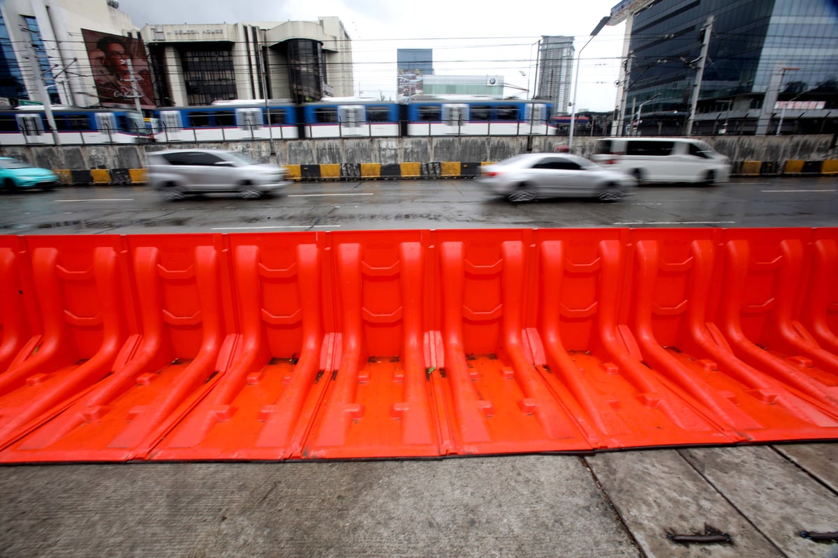(July 10 2026) In preparation for the impact of Inday, the MMDA has prepositioned flood barriers in front of Gate 4 of the Camp Aguinaldo in Quezon City on Friday, July 10, 2026, to block flood water flowing from the camp and prevent it from reaching EDSA. Photo/Analy Labor