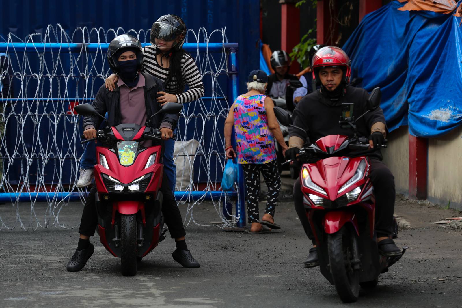 Concrete barriers, razor wire, and container vans block roads leading to the Malacañang Complex in Manila on 10 July 2026 as authorities tighten security ahead of an anti-corruption protest at Liwasang Bonifacio organized by an interfaith group.