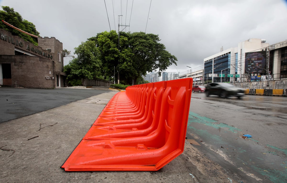 (July 10 2026) In preparation for the impact of Inday, the MMDA has prepositioned flood barriers in front of Gate 4 of the Camp Aguinaldo in Quezon City on Friday, July 10, 2026, to block flood water flowing from the camp and prevent it from reaching EDSA. Photo/Analy Labor