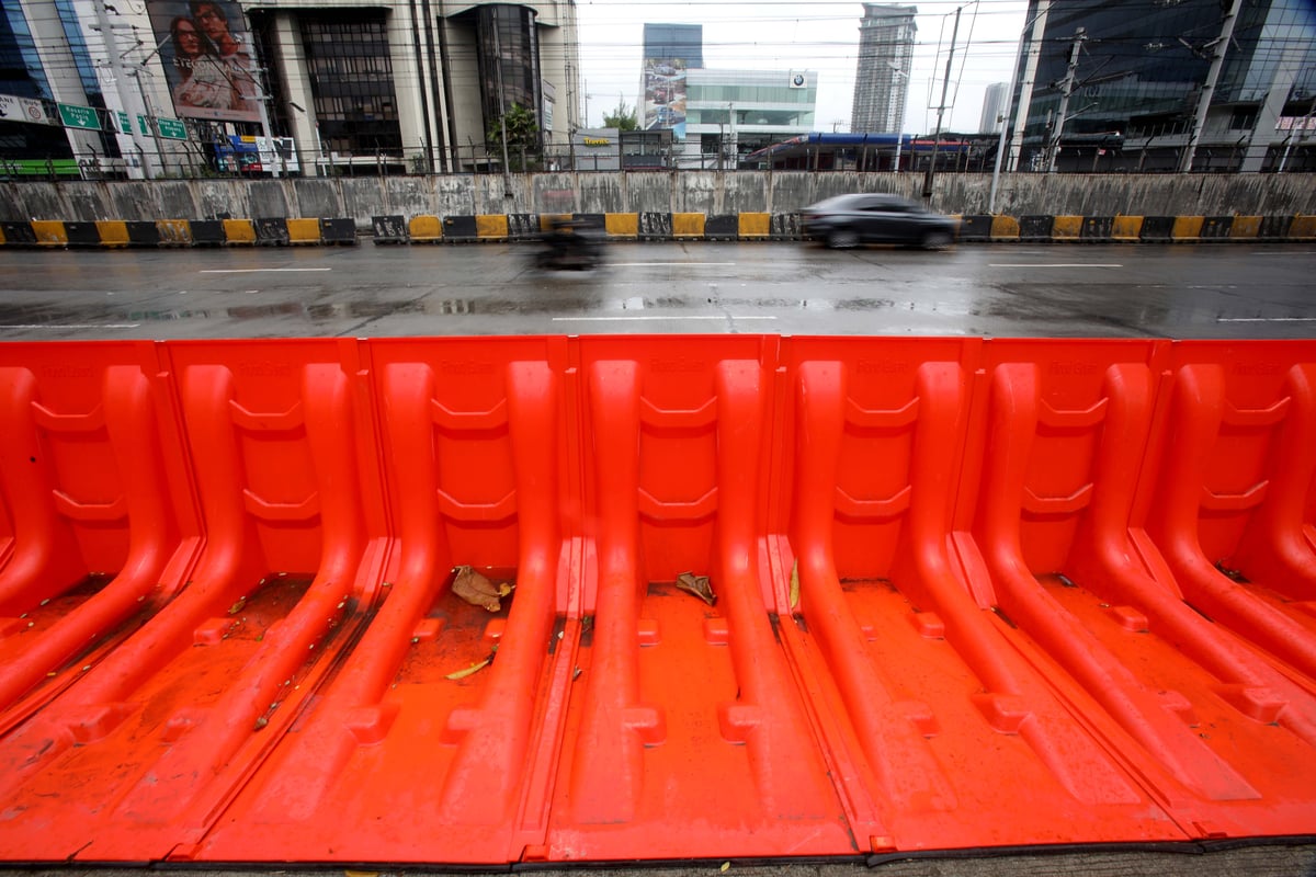 (July 10 2026) In preparation for the impact of Inday, the MMDA has prepositioned flood barriers in front of Gate 4 of the Camp Aguinaldo in Quezon City on Friday, July 10, 2026, to block flood water flowing from the camp and prevent it from reaching EDSA. Photo/Analy Labor