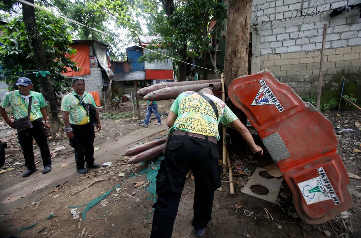 (July 10 2026) Local officials in Barangay Bagong Silangan inspect low-lying areas, the position of rescue boats and to monitor flood-prone communities on Friday July 10 2026, ahead of expected heavy rains brought by the Southwest Monsoon, enhanced by the effects of Typhoon Inday. Photo/Analy Labor